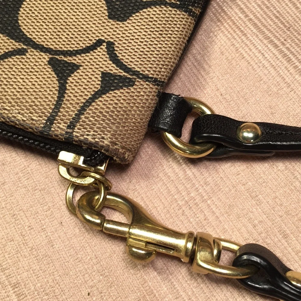 Coach leather and fabric monogram wristlet
